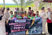 Penyaluran Bantuan Pada Korban Banjir dari BJA Gorontalo ( Foto: Serambinews/Tribunewsaceh.com)